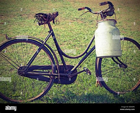 Ancient Milking Bike With Milk Canister And Vintage Effect Stock Photo Alamy