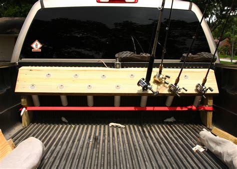 For a fishing rod holder i used a blacktip three rod rod holder next slide your carriage bolts into the truck rail at the same distance of your mounting holes. EASY Truck bed rod holder---20 bucks and a 6 pack - The ...