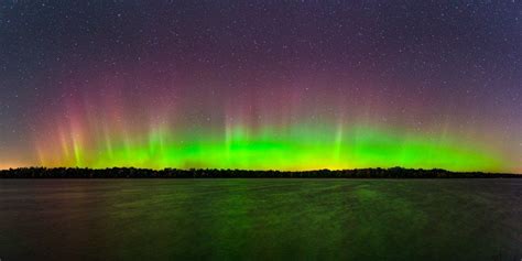 Panoramic View Of The Northern Lights Over The Biron Flowage In