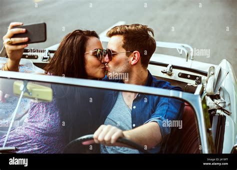 Couple Driving A Car Traveling On Road Trip Together Stock Photo Alamy