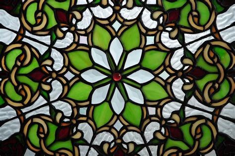 the front hall floral green stained glass window will make a stunning addition to any decor