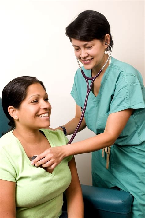 Free Picture Female Clinician Dressed Scrubs Stethoscope