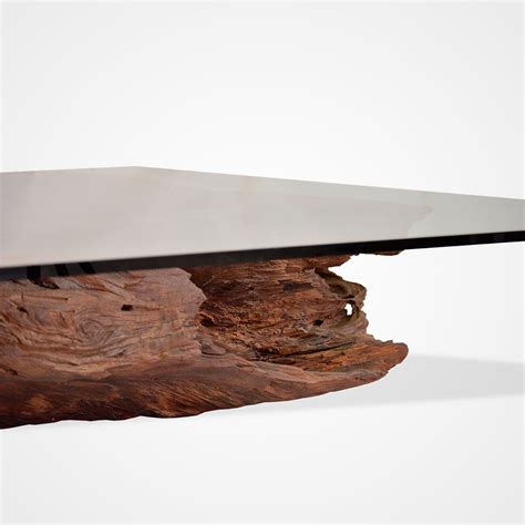 Its tempered glass top sits atop four sleek rounded legs, which in. Salvaged Wood and Square Glass Top Coffee Table - Rotsen ...