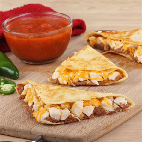 Mix leftover roast chicken with grated cheese, mango chutney and chopped spring onions. Easy Chicken Quesadillas | Recipes | Spoonful | Food ...