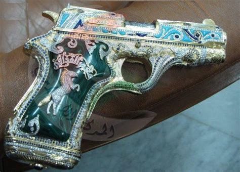 Muammar Gadaffis Gun Its Made Out Of Pure Gold And Has His Name