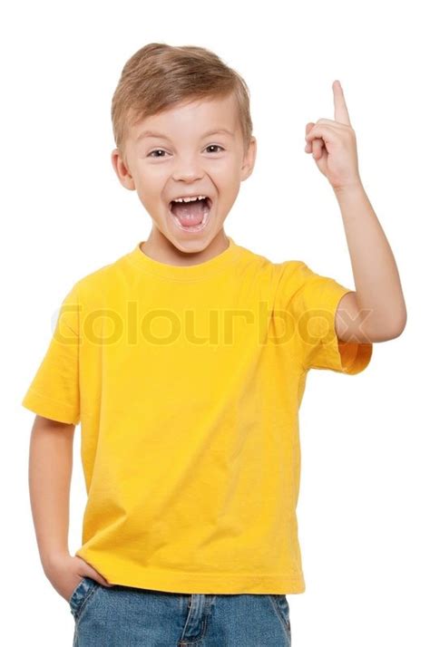 Cheerful Little Boy Pointing Up Over Stock Image Colourbox
