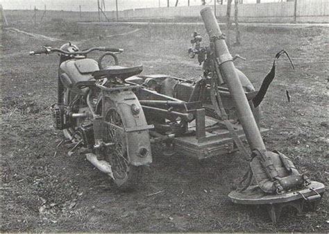 A Soviet M72 Motorycle With A M1937 82mm Mortar Mounted On The Sidecar