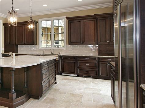 Below are a variety of small kitchen ideas that match dark cabinets with countertops, backsplash and flooring to create a beautiful cooking and dining space. backsplash ideas for cherry cabinets and light countertops ...