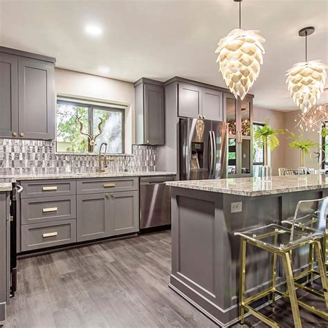 If it is a laminate cabinet, then staining would not be recommended as there is particle board under the laminate, which lacks the wood grains needed to bring out the stain colors. Can Laminate Cabinets Be Painted? - Battle Born Painting