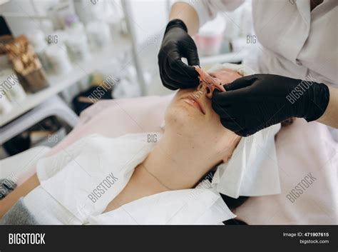Beautician Removes Image And Photo Free Trial Bigstock