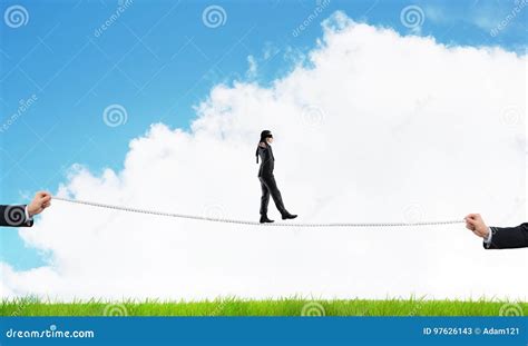Business Concept Of Risk Support And Assistance With Man Balancing On