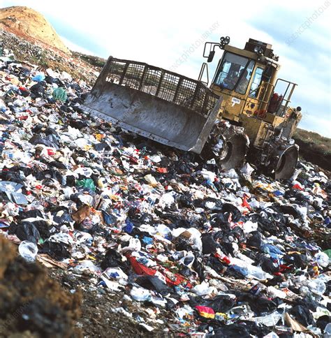 View Of A Bulldozer Working A Landfill Refuse Site Stock Image E800