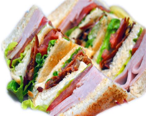 Pile on half the turkey, two slices of perfectly cooked bacon, two slices of tomato, and two lettuce leaves. Turkey Club Sandwich | JK Chicagodogs