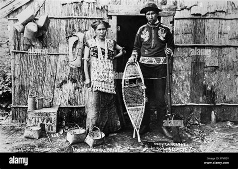 Menominee Couple 1908 Na Menominee Native American Couple Standing Outside A Bark House In