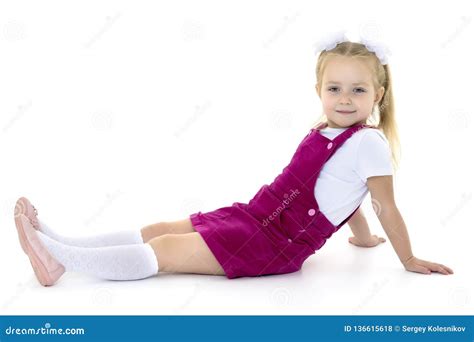 Little Girl Is Sitting On The Floor Stock Photo Image Of Legs