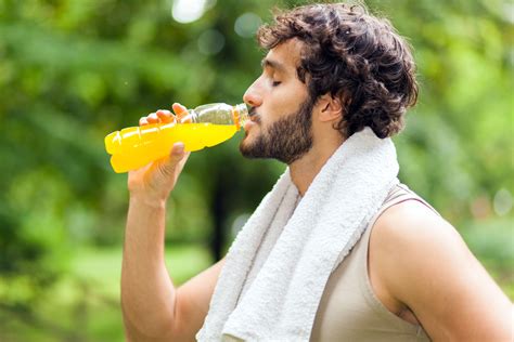 Young Man Drinking After Sport Aspartame