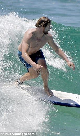 Simon Baker Spotted Gliding Across A Christmas Day Wave At Bondi