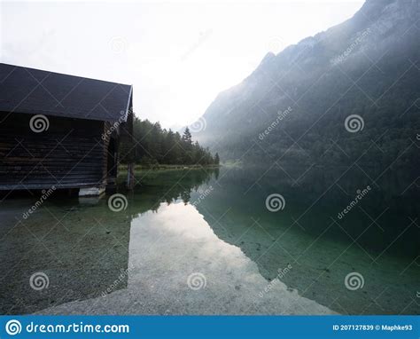 Panorama Reflection Of Boat House On Alpine Mountain Lake Konigssee