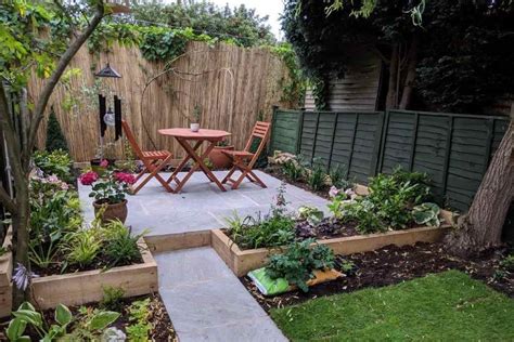 So, the homeowners paved part of the area with flagstone and added a table and chairs. An urban jungle garden design for a Norwich garden