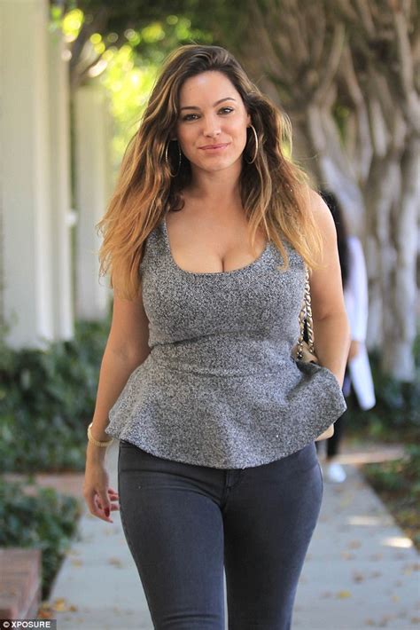 Newly Single Kelly Brook Squeezes Ample Assets In Tight Peplum Top As She Shops Till She Drops