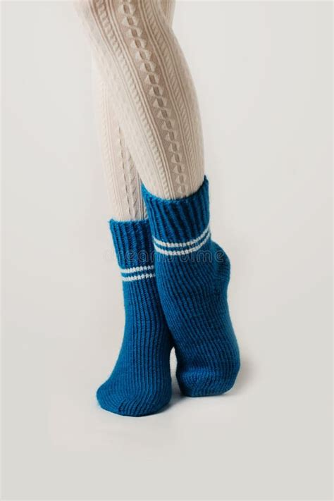 Female Legs In White Stockings And Blue Knitted Socks Stock Image Image Of Female Color