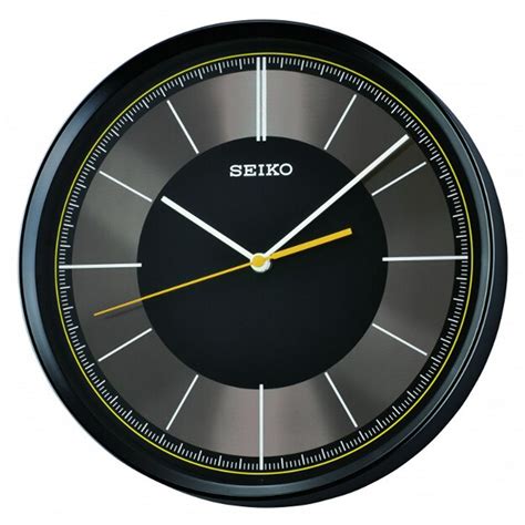 The analog clock has a second hand. Seiko Black Dial Quiet Sweep Wall Clock QXA612KLH