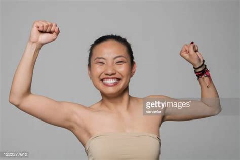 Asian Woman Fist Photos And Premium High Res Pictures Getty Images
