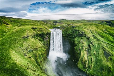 Legend Has It That Icelands Stunning Skógafoss Waterfall Is Home To