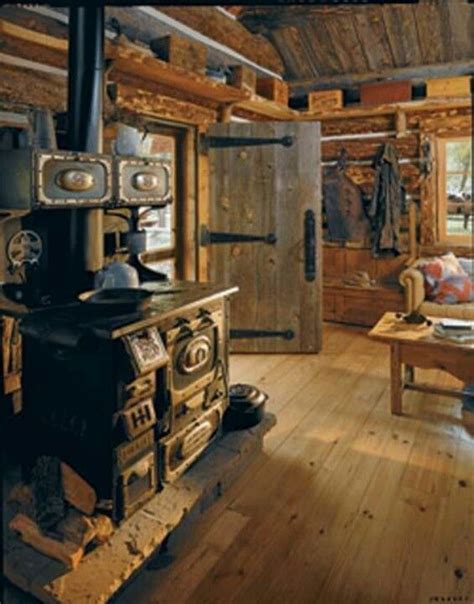 This log cabin has 2 bedrooms, 1 bathroom and sleeps 5. love the stove | Rustic Wannabe | Pinterest
