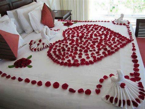 Romantic White Bed Decorated With Red Roses 2026669 Weddbook