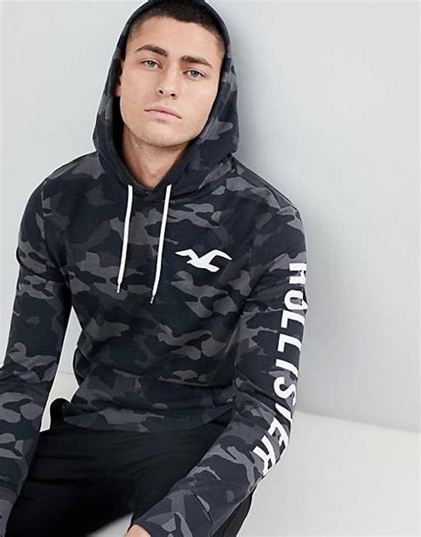 Hollister Back And Sleeve Logo Camo Print Hoodie In Black Asos