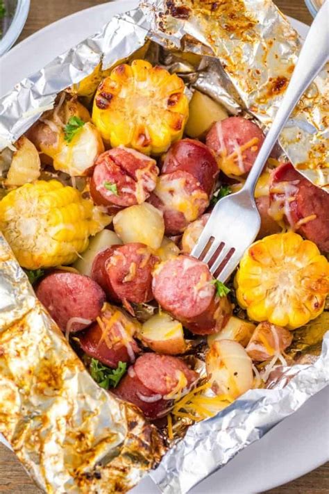 Cheesy smoked sausage and cabbage casserole. This Smoked Sausage and Potatoes Foil Packet Meal is a simple recipe that's ready in under ...