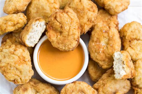 Crispy, boneless chicken breast and thigh meat chunks. 7 Healthy, Homemade Chicken Nugget Recipes - Daily Parent