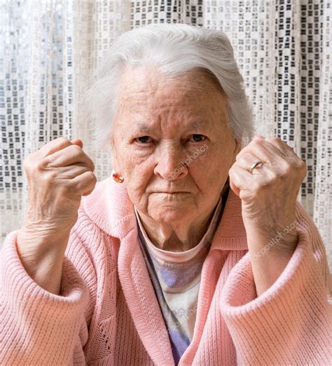 Portrait Of Old Woman In Angry Gesture Stock Photo By ©vbaleha 62154137