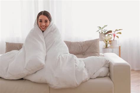 Woman Wrapped In Blanket Resting On Sofa Space For Text Stock Image Image Of Light Caucasian