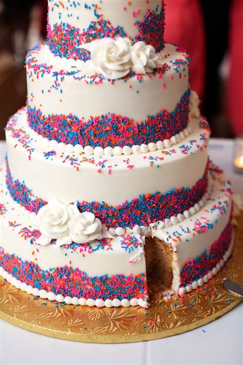 A showstopping funfetti cake with pillowy soft layers of white cake speckled with colorful sprinkles. The Sweetest Day. - Sallys Baking Addiction