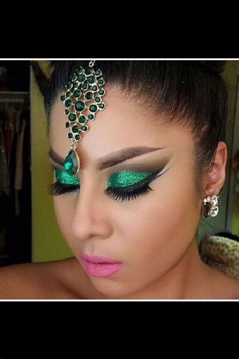 her eyebrows are bothering me but everything else is auhmazing indian makeup and jewelry