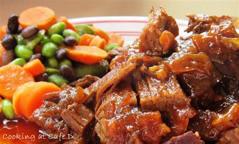 Ultra tender, juicy slow cooker beef brisket smothered in a homemade bbq sauce. Cooking at Café D: Low, Slow and So Worth It! (Our New Series)