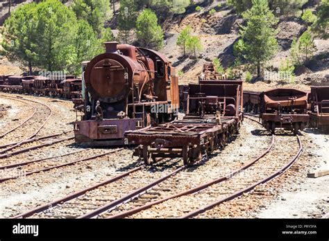 Rusty Steam Locomotive In Railroad An Train Wagons Stock Photo Alamy