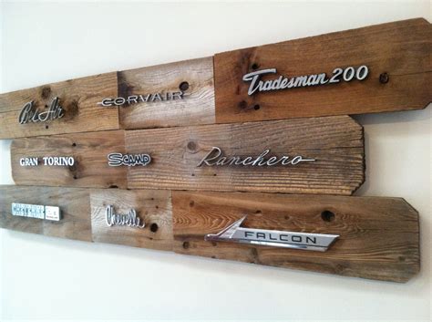 Handmade reclaimed wood art adorned with vintage auto ...