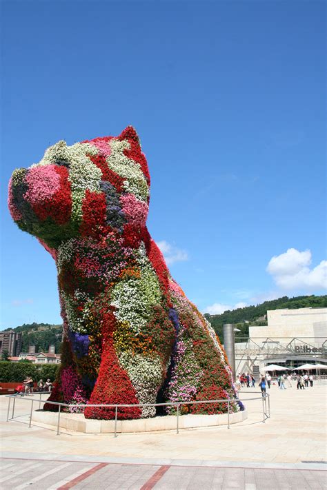 More than 40 feet tall, the west puppy is a permanent installation, but twice a year, in may and october, all of the plants that make up the sculpture's exterior are replaced with fresh. Archikey.com | Buildings | Puppy