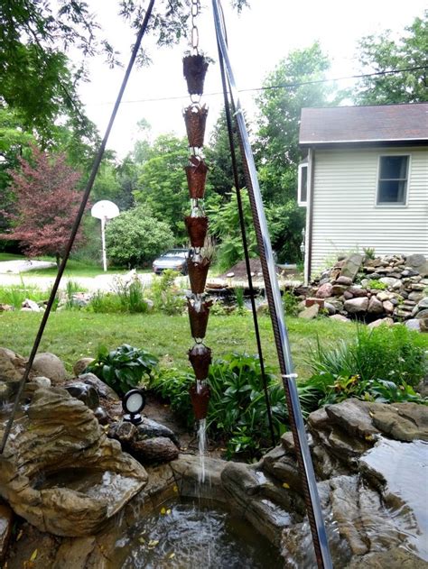 Rain chains are not only beautiful, simple to make with few tools and materials, but they can also turn gutter system downspouts. Pin by Garden Gnomes Etc on Copper Rain Chain Cups ...