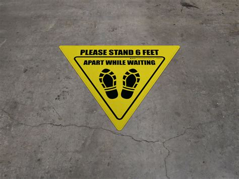 Please Stand 6 Feet Apart While Waiting Shoe Prints Yield