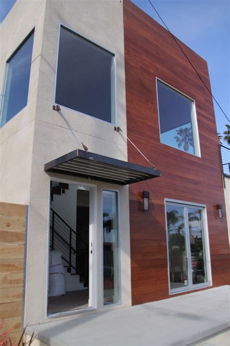 Check out our awning and canopy design for a variety of businesses, projects and styles. steel cable awning | Awning over door, House designs ...