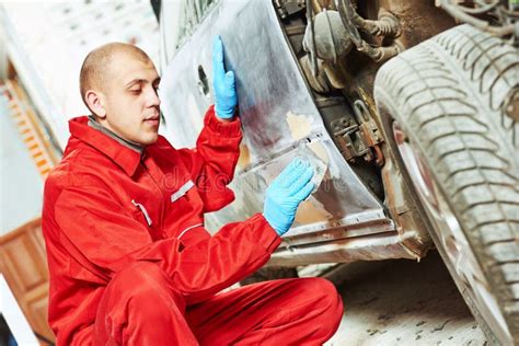 Worker Applying Car Body Repair Putty Stock Photo Image Of Filler