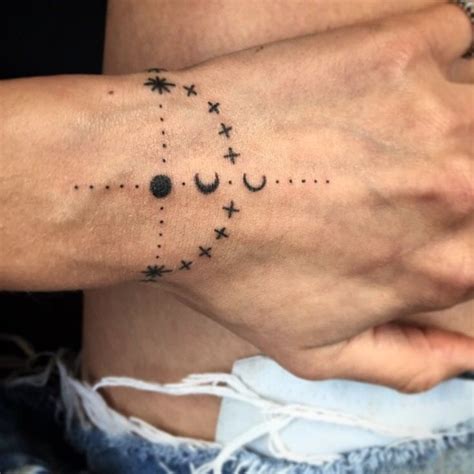 Flower tattoos are one of the most popular tattoo designs on the planet. simple tattoos | Tumblr | Wrist tattoos for guys, Cool ...