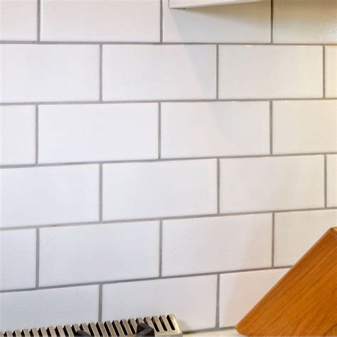 Crackled White 3 X 6 X 3125 Subway Tile With Delorean Gray Grout