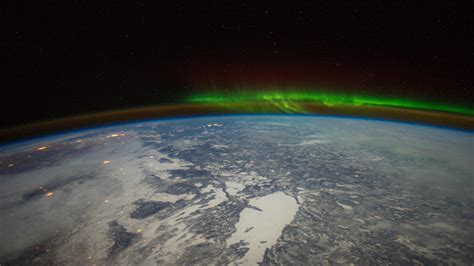 Planet Earth Seen From The International Space Station With Aurora