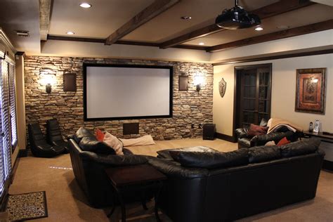 Stunning Basement Media Room Design With Stone Wall Decor And Black