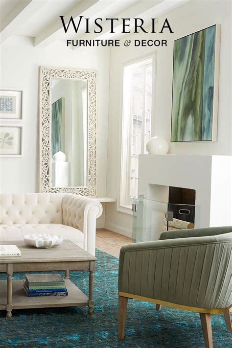 Play Up An All White Living Room With Cool Blue Green